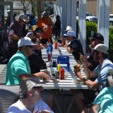 Golfers and friends chow down prior to teeing off.